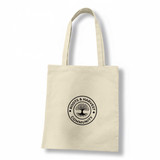 A cream-coloured recycled cotton tote bag with a circular logo featuring a tree design and text.