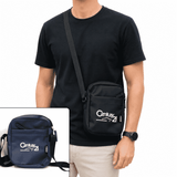 A black messenger bag with a shoulder strap and a small inset image of a navy messenger bag, both featuring a logo.