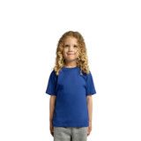 A blue kids' t-shirt with short sleeves displayed on a smiling child with curly hair. The shirt features a logo.