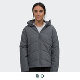 A women's puffer jacket in grey featuring a zip front and a hood, displayed on a model.