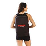A black ECO NOVA computer backpack with a logo, worn by a person from behind, showcasing its sleek design.