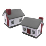 Two stress shapes designed like houses, featuring white walls, grey roofs, red doors, and grey chimneys.