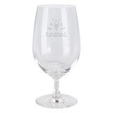 A clear glass beer glass with a round bowl and a slender stem. Features a logo on the front.