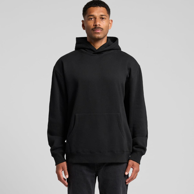 A black hoodie featuring a front pocket and a hood, worn by a standing man. It has a logo on the garment.