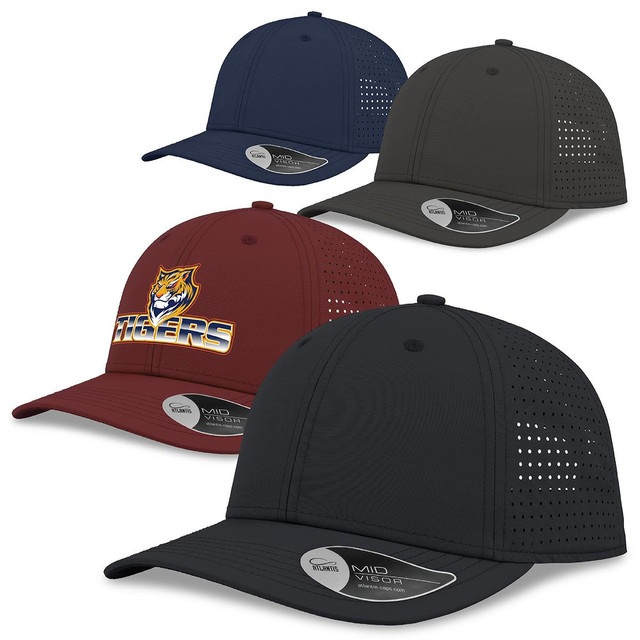 Four caps in navy, dark grey, burgundy, and black, featuring perforated designs and a logo on one.