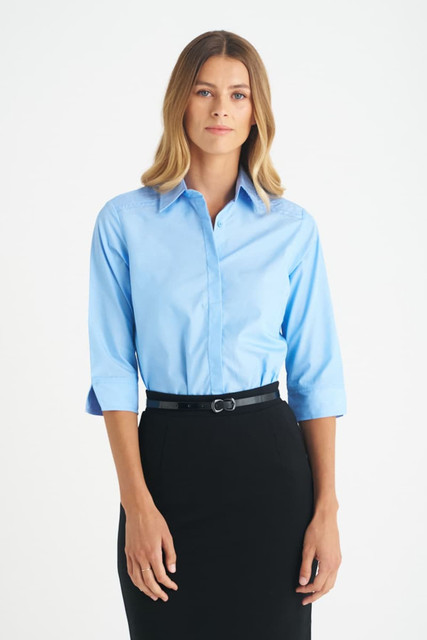A blue ladies' 3/4 sleeve button-up shirt with a classic collar, styled with a black skirt. Features a small logo.