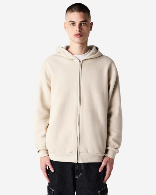 A unisex full zip hooded sweatshirt in a light beige colour with a hood and front zip, featuring a logo.