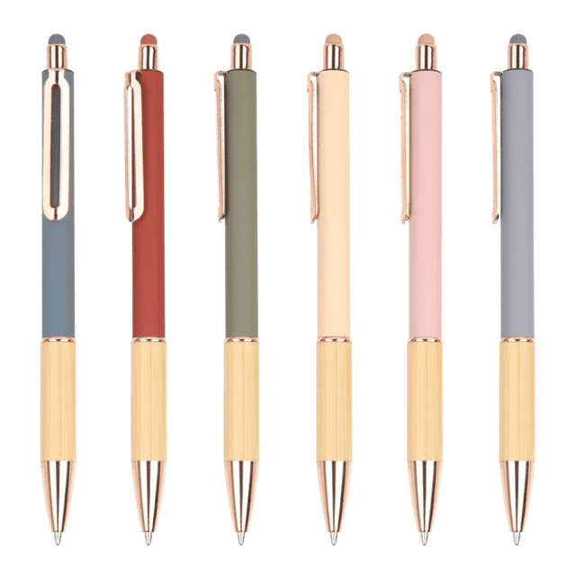 A collection of six wooden pens in blue, red, green, cream, pink, and grey, with gold accents and clips.