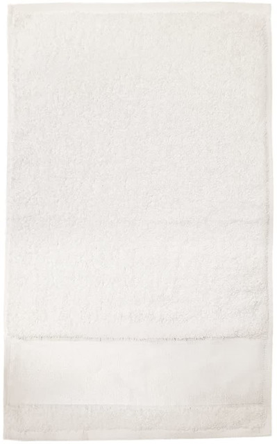 A white bath towel featuring a plush texture, with a smooth band at one end and a subtle branding logo.