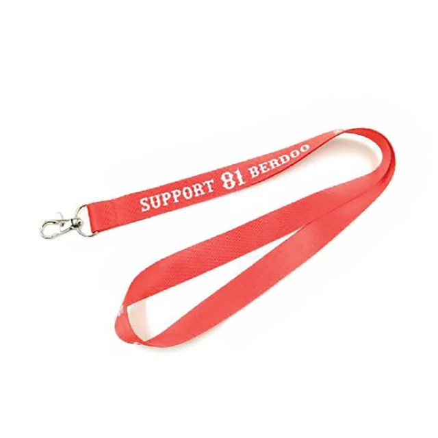 A red nylon lanyard with a metal clip and a logo on the strap. Suitable for events and exhibitions.