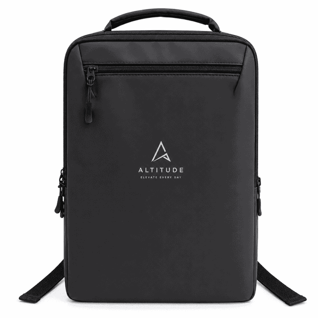 A black backpack with a minimalist design, featuring a logo and multiple zippers for storage.