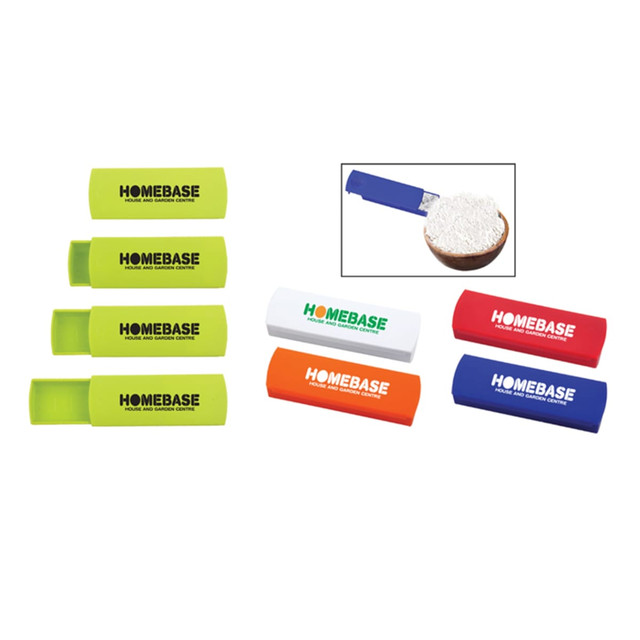 A set of colourful measuring spoons in green, blue, orange, white, and red, with a logo on each.