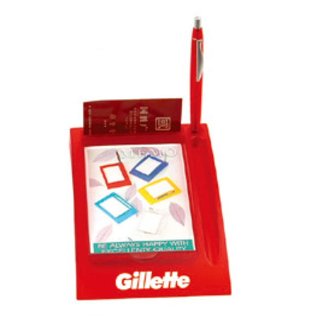A red memo holder with a pen, featuring several coloured note markers and a branding logo.