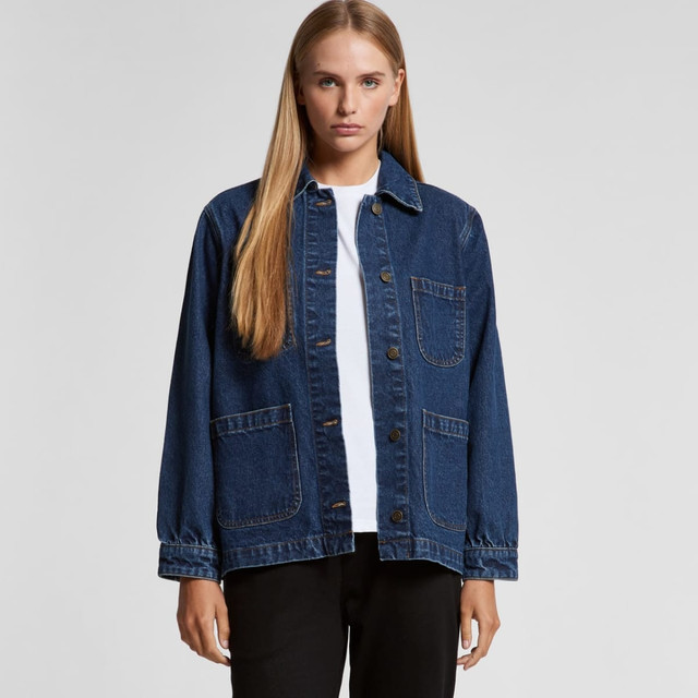 A denim chore jacket in dark blue with a button-up front and two front pockets. It features a collar and long sleeves. A denim chore jacket in dark blue with a button-up front and two front pockets. It features a collar and long sleeves.