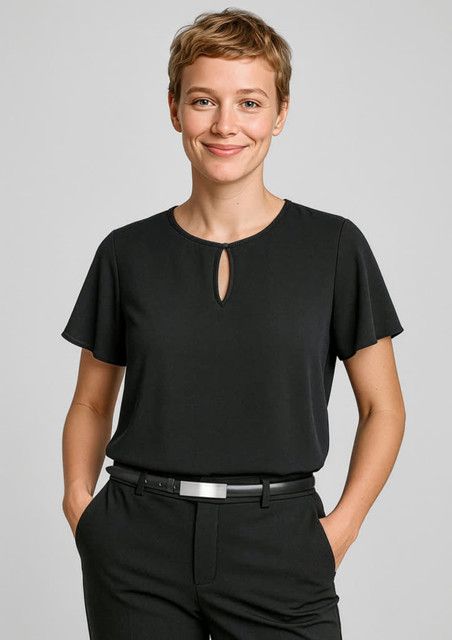 A black short sleeve blouse featuring a keyhole detail at the neckline, accompanied by a person wearing tailored trousers.
