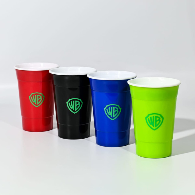 A set of four double wall plastic cups in red, black, blue, and green, featuring a logo on each.