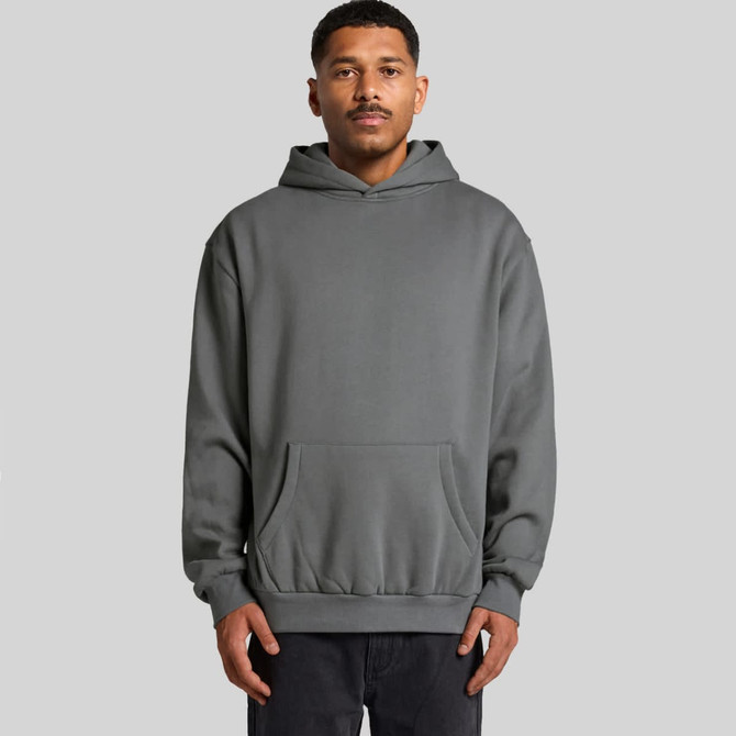 A grey hoodie featuring a front pocket and a drawstring hood, modelled by a man. It has a logo on it.