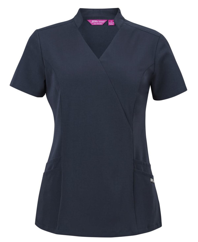 A navy scrub top with a nu mandarin collar and short sleeves, featuring two front pockets and a logo.
