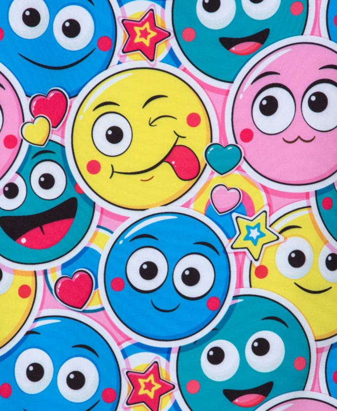 A vibrant patterned fabric featuring colourful smiley faces in blue, yellow, and pink, along with stars and hearts.