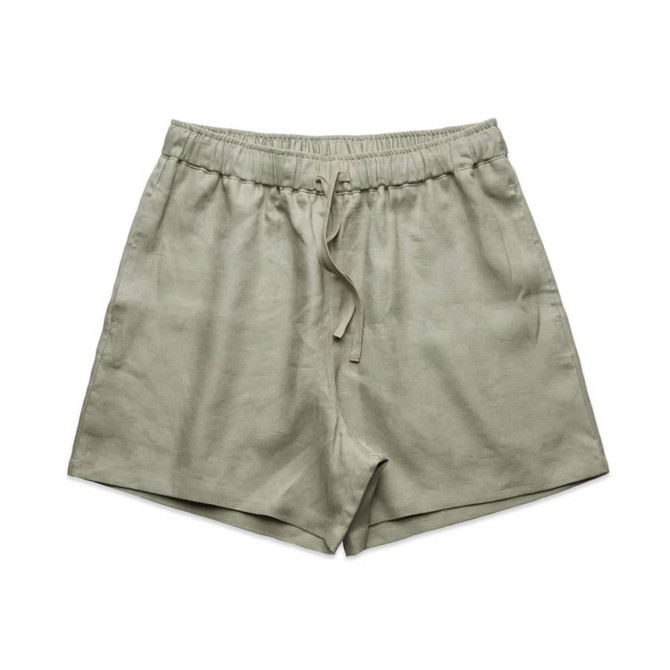 Linen dress shorts in a light green shade with an elastic waistband and drawstring. Features branding.