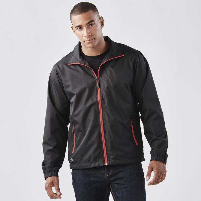 A black men's jacket with red accents, featuring a zippered front and side pockets. It has a logo on the sleeve.