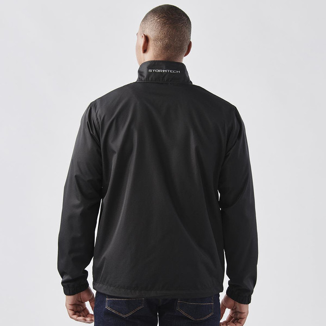 A black jacket with a high collar and branding on the back, featuring a simple and sleek design.