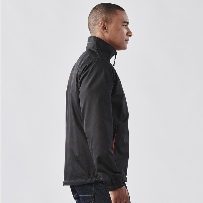 A black men's jacket featuring a high collar and zip, with a side profile view. It has a logo on the sleeve.