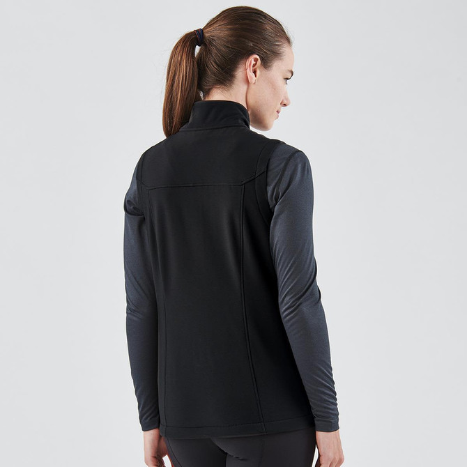 A black women's softshell vest with a high collar, featuring a fitted design and long sleeves.