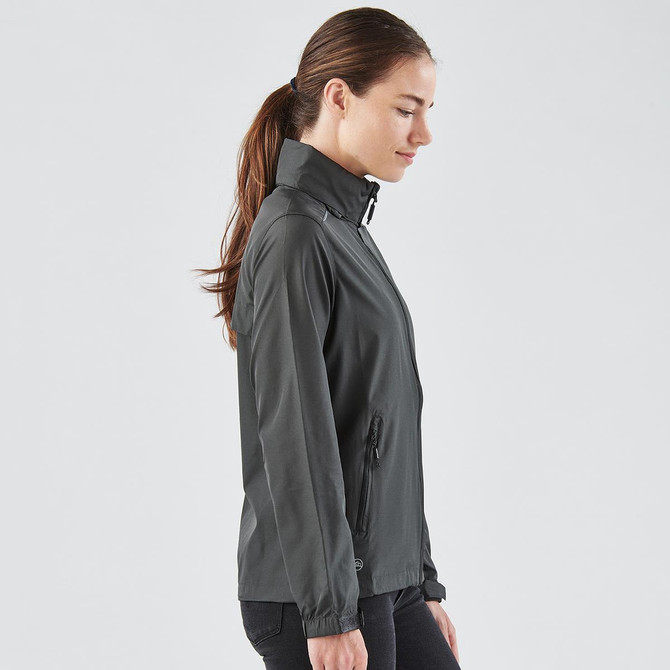 A women's rain jacket in dark grey, featuring a stand-up collar and zippered pockets. It has a subtle logo.