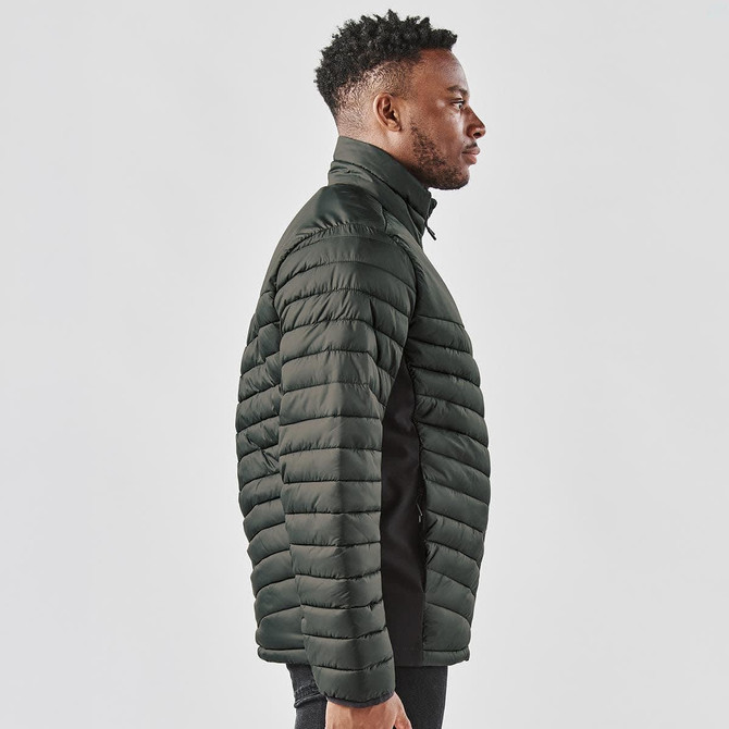 A men's Montserrat thermal jacket in dark green, featuring a quilted design and a high collar, with a logo.