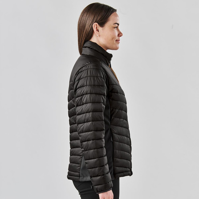 A black women's thermal jacket with a quilted design, featuring a high collar and a side view of the model.