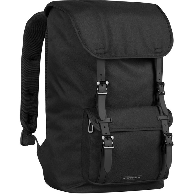 A black backpack with a flap top, adjustable straps, and a front pocket. It features a logo on the front.