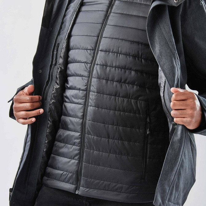 A black men's Avalante System jacket, featuring a zippered front and a layered puffer inner lining.