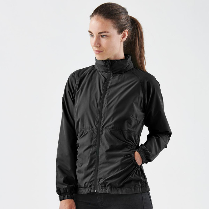 A black women's rain jacket featuring a zip front and elasticised cuffs, with a logo displayed.