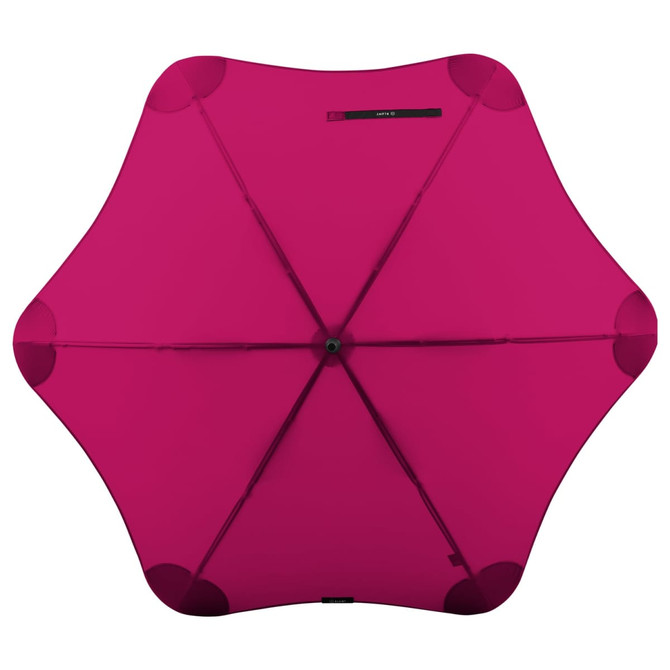 A pink BLUNT Classic Umbrella with a unique, eight-panel design and a central hub. It features a logo on the handle.