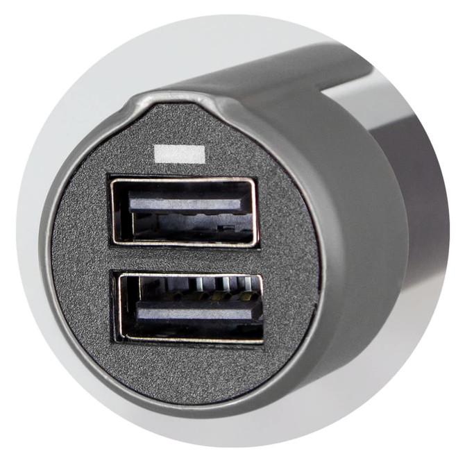 A grey USB car charger featuring two USB ports and a rounded design. It has a logo on the surface.