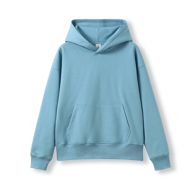 An oversized hoodie in a soft blue colour, featuring a front pocket and a large hood. It has a logo.