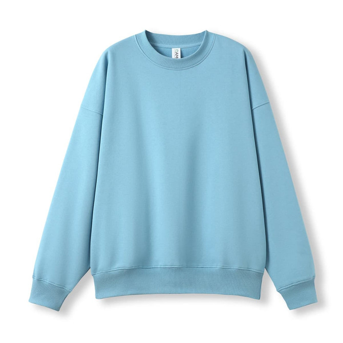 A light blue oversized crew neck fleece jumper with long sleeves and a relaxed fit. It features a logo.