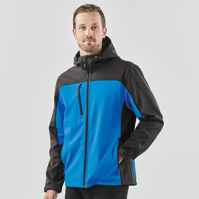 A men's softshell jacket featuring a blue and black colour scheme, with a hood and front zip. Includes a logo.