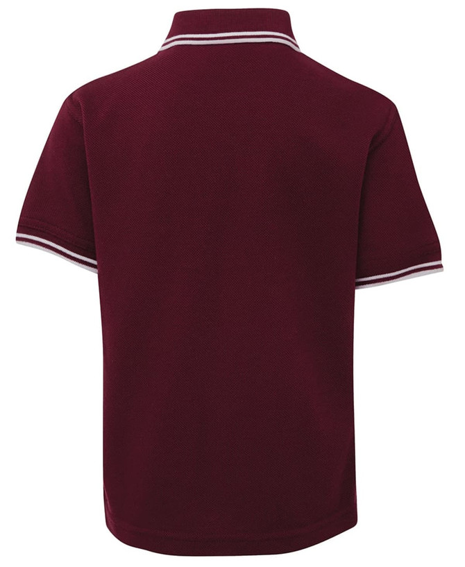 A maroon polo shirt featuring a contrasting collar and cuffs, with a logo present on the design.