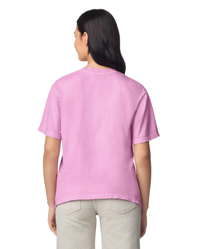 A pink heavyweight adult T-shirt displayed from the back, featuring a classic style and a simple design.