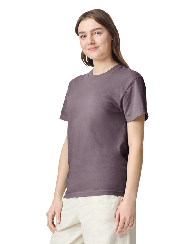 A heavyweight adult t-shirt in a muted purple colour, displayed on a model with a relaxed fit.