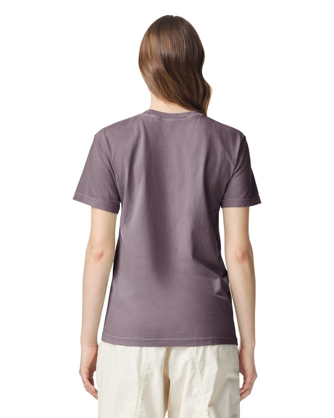 A back view of a women’s adult heavyweight t-shirt in a muted purple colour, featuring a logo.