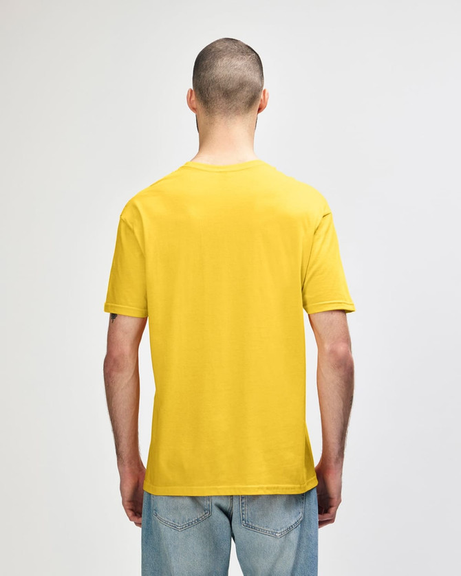 A yellow Gildan Softstyle adult T-shirt displayed from the back, featuring a plain design and a logo.