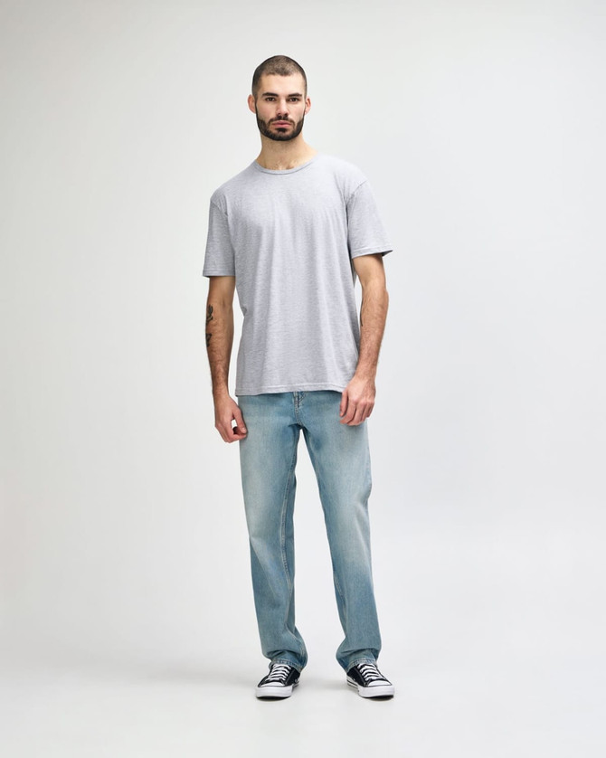 A grey Gildan Softstyle adult t-shirt with a straight back design, displayed on a model.