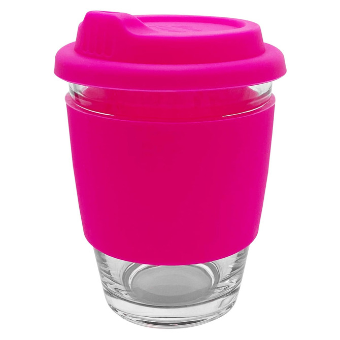 A reusable coffee cup with a clear glass body and a bright pink silicone sleeve and lid. It features a logo.