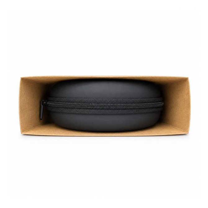A black circular case for Equinox ANC headphones, displayed inside a rectangular brown box.
