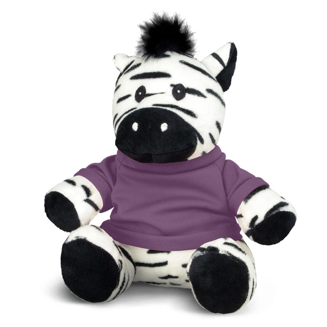 A plush zebra toy with black and white stripes, wearing a purple top. It has a tuft of black fur on its head.