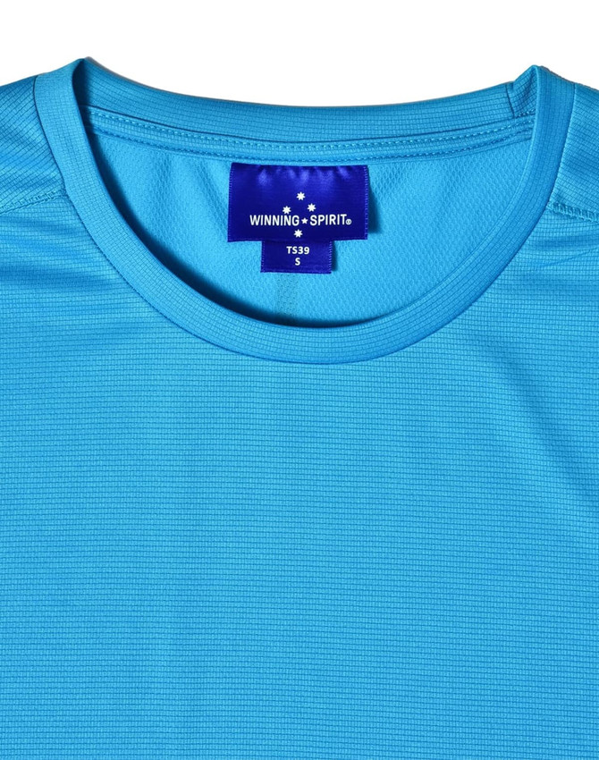 A light blue men's short-sleeve performance T-shirt featuring a textured fabric and a brand label.