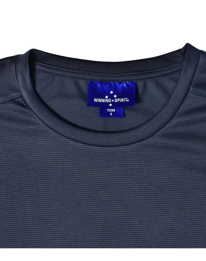 A close-up of a dark grey men's lightweight performance short-sleeve tee with a logo tag at the neckline.